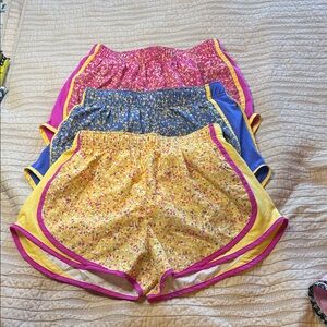 Nike Women's Athletic Shorts in Pink, Blue, and Yellow